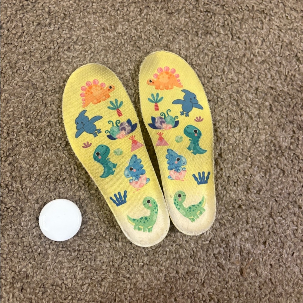 Kids' Yellow Dinosaur Insoles with apple air tag